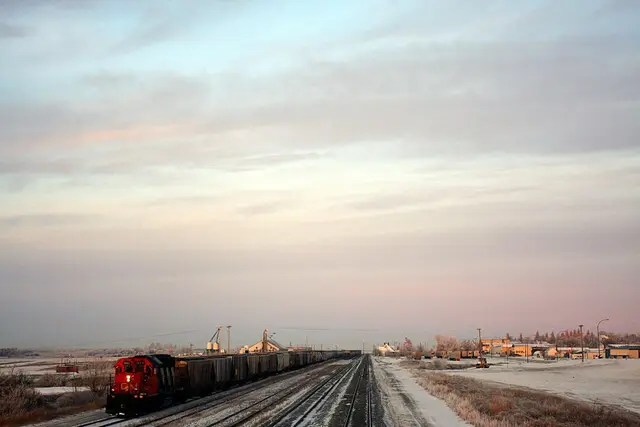 CN train in the rail yard at dawn